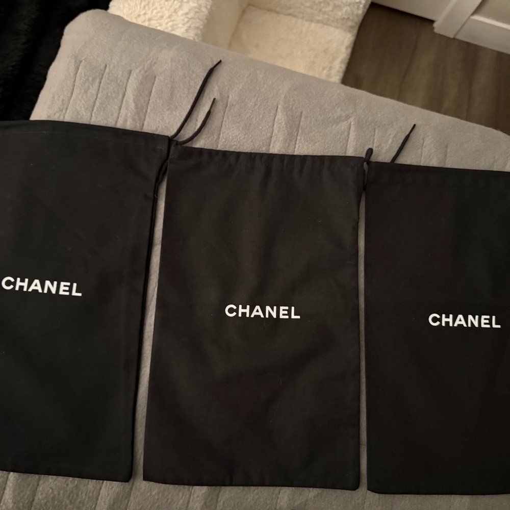 CHANEL Black Drawstring Bags